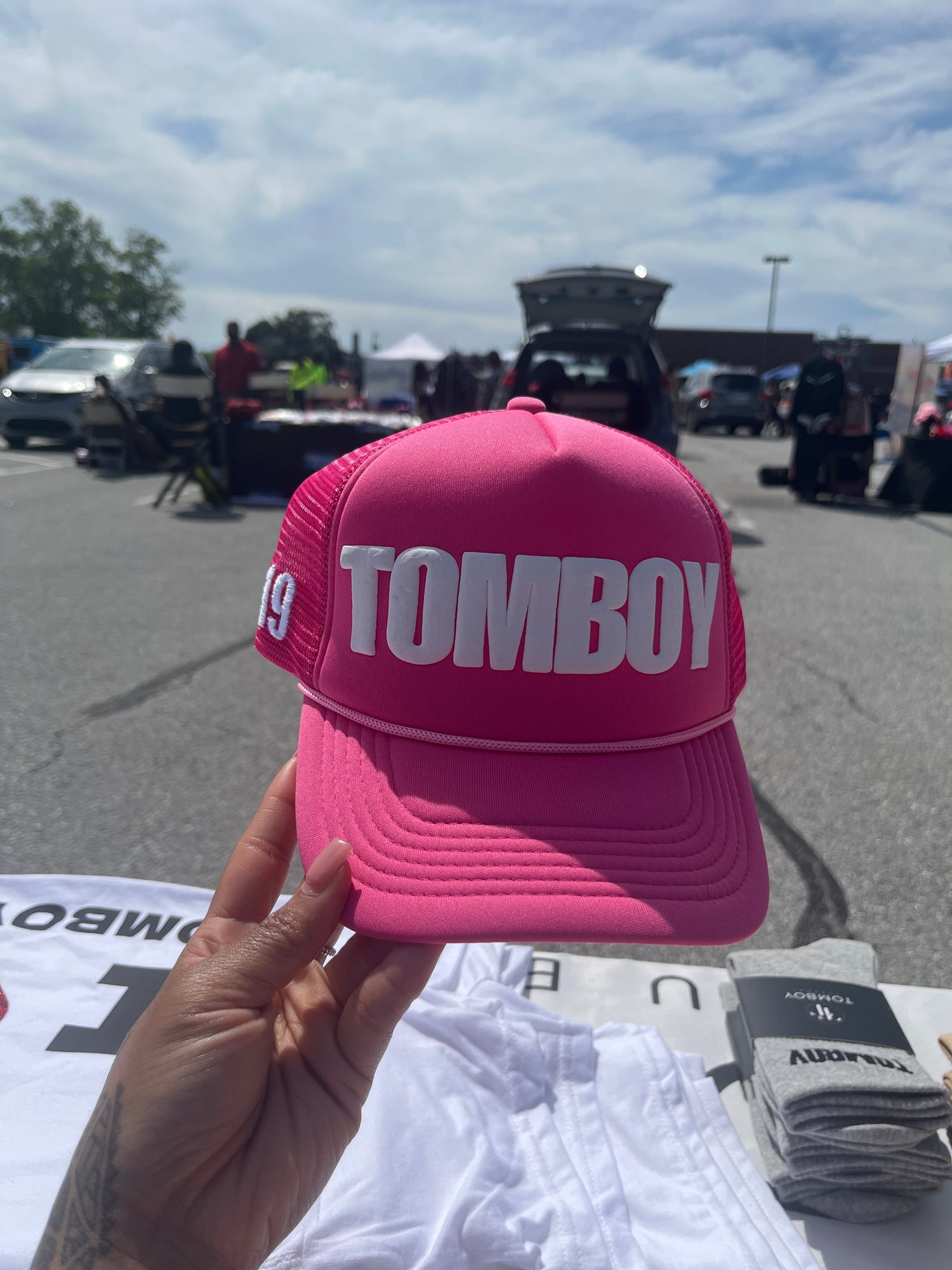 Hot Pink snapback hat that says TOMBOY in a bold, all caps font.